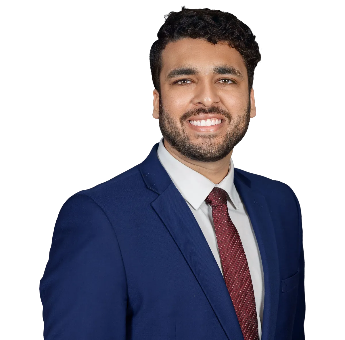 Portrait of Dr. Anuj Shah wearing a navy suit, white shirt, and burgundy tie, smiling